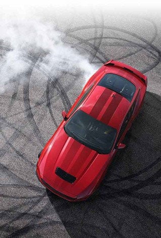 Overhead view of a 2024 Ford Mustang® model with tire tracks on pavement | Santee Ford in Manning SC